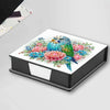 A square storage box for DIY diamond painting featuring a colorful bird pattern with 150 gemstones.