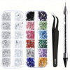 A collection of multi-size flat back acrylic rhinestones in various colors arranged in compartments.