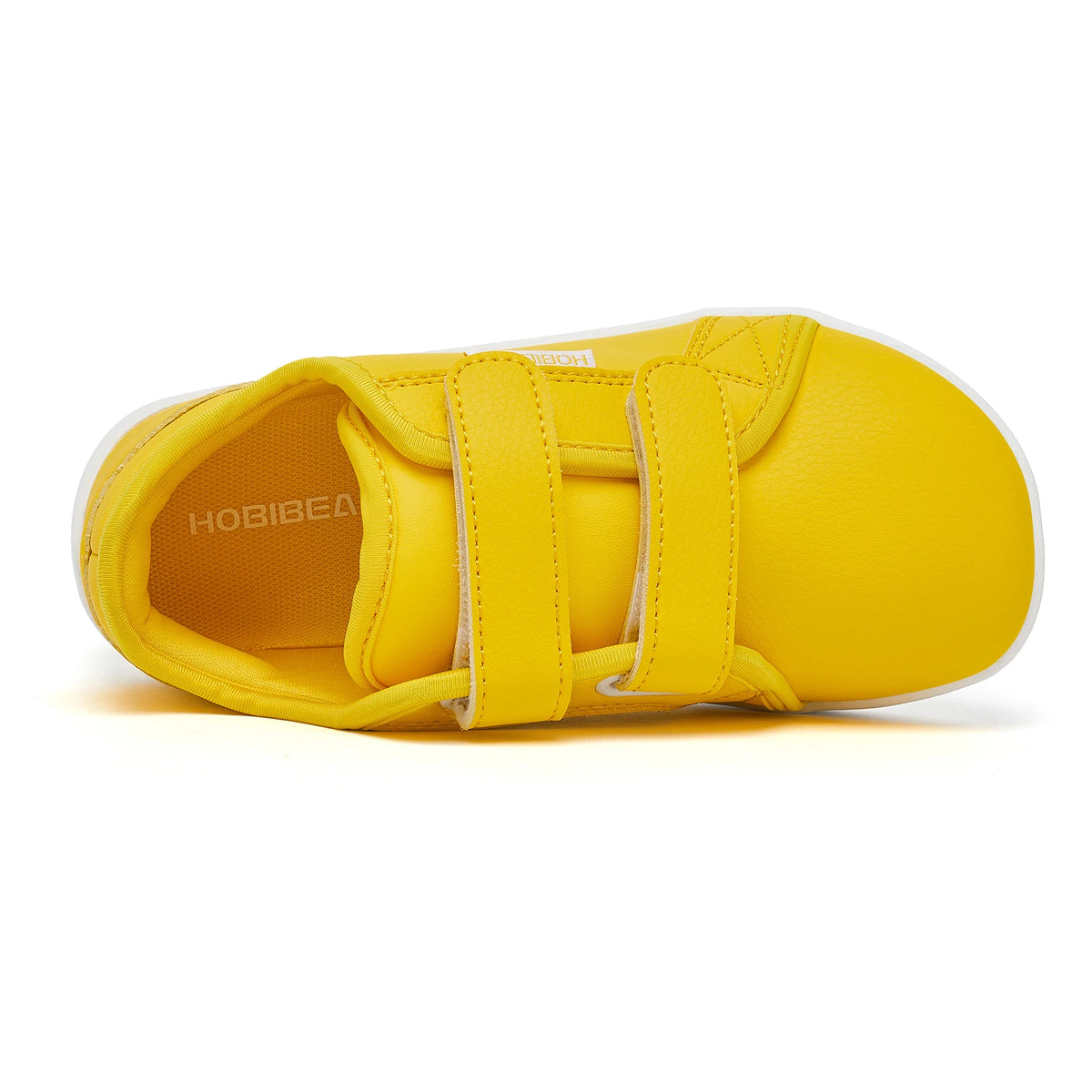 Yellow kids barefoot sneakers with double hook-and-loop straps shown from the top view