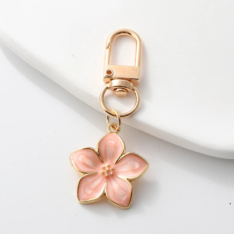 Floral Enamel Keychains with Vibrant Plant Designs