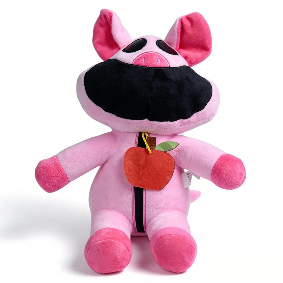 A pink plush doll resembling a pig with black facial features and a zipper detail.