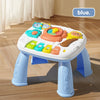 A white musical baby piano playmat with a light-up keyboard and hanging toys in blue and yellow colors.