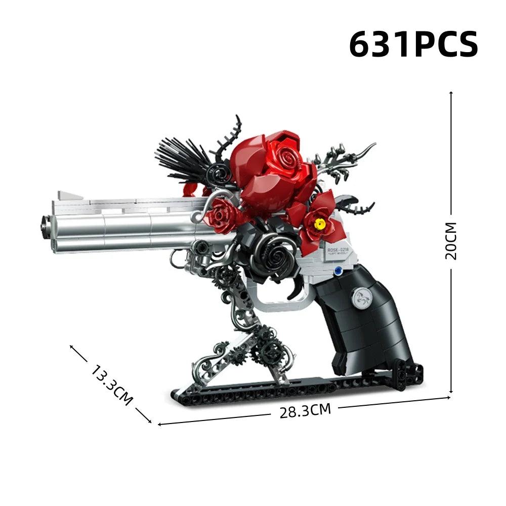 A silver and black gothic skeleton hand and rose cross building set with a barrel and decorative elements.