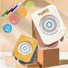 A white and yellow geometric spirograph drawing set with creative templates displayed on a wooden surface.