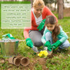 A woman and a girl are planting seeds in the soil using biodegradable peat pots.