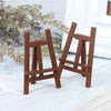 Mini wooden artist easel for a dollhouse featuring two wooden easels and lavender branches