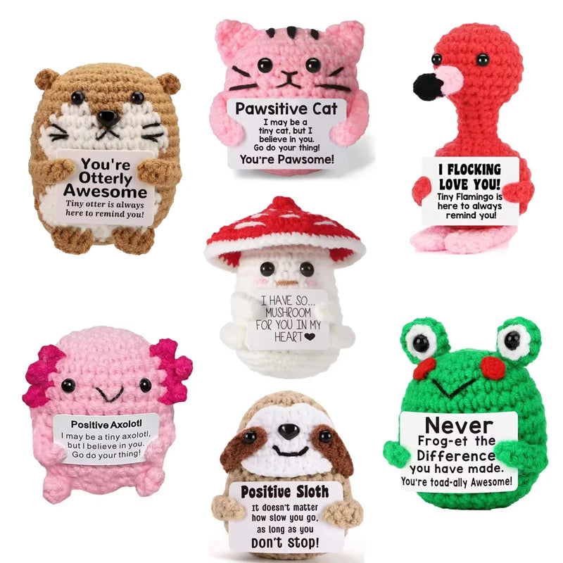 A collection of handmade crochet emotional support owl figures with various inspirational messages and colors.