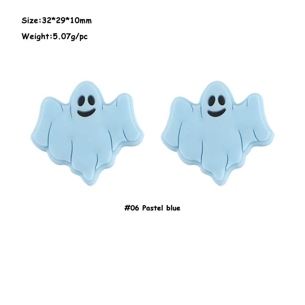 A set of five light blue silicone ghost-shaped beads for jewelry making