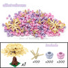 A set of building blocks featuring pink and yellow cherry blossom themed pieces, including 7 units.