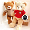 Two fluffy teddy bears with black safety eyes, one brown and one beige, standing next to a woven basket.