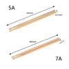 Two sets of wooden drumsticks, labeled 5A and 7A, showing their lengths and thickness.