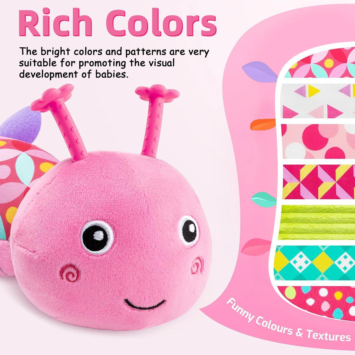 A pink caterpillar plush toy with large eyes and a smiling mouth is shown against a background of colorful patterns.