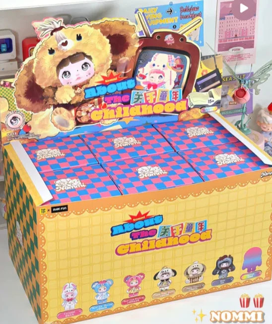 A box of Nommi Childhood Series blind box collectible dolls featuring a large plush character and various figures.