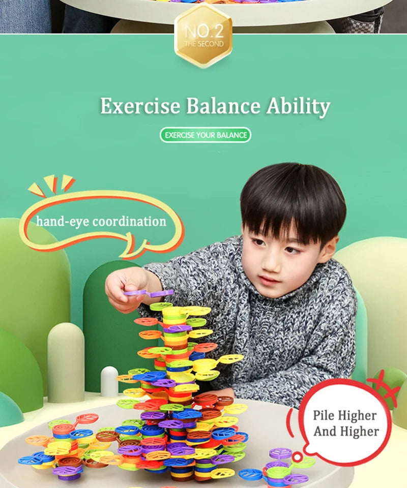 A child is stacking colorful rainbow blocks to exercise hand-eye coordination and balance ability.