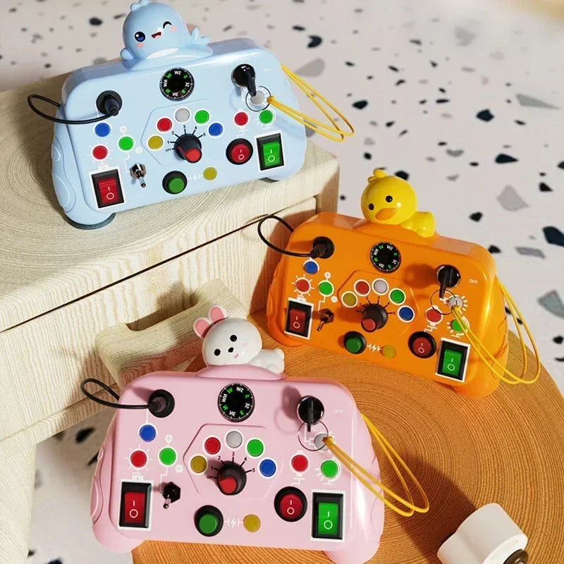 Three colorful Montessori busy boards with LED light switches for toddlers displayed on a wooden surface.
