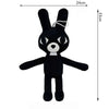 A black plush toy shaped like a rabbit with large eyes and a white nose.