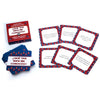 A set of red puzzle cards with Spanish questions for a family game night
