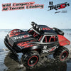 A black and red 4x4 off-road monster truck is shown driving through water.