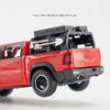 A red RAM pickup truck with a black canopy is shown, ready to be pulled back and let go.