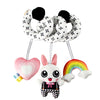 Un set de miroirs-rattles de développement avec une tête de lapin et un anneau arc-en-ciel.
