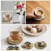 A set of DIY diamond art coasters featuring a cute dog design with metal holders.