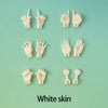 A collection of white, articulated doll hands and fingers displayed against a light green background.