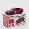 A red die-cast model of a sports car on its packaging box.