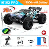 A black and blue 16102 PRO RC monster truck with large tires and LED lights shown in a studio setting.