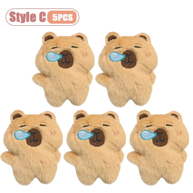 Five cute brown bear plush keychains with blue squeakers