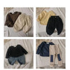 A collection of kids long sleeve cotton tees in various solid colors and neutral tones.
