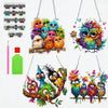 A set of diamond art acrylic pendants shaped like colorful, detailed owls and other birds.