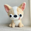 A fluffy chihuahua plush doll with light tan and white fur, featuring large eyes and a tongue sticking out.