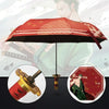 A red and black patterned 3-fold umbrella is shown open against a background featuring a Demon Slayer character.