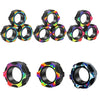 A set of three magnetic fidget spinning rings in various colors and patterns for stress relief.