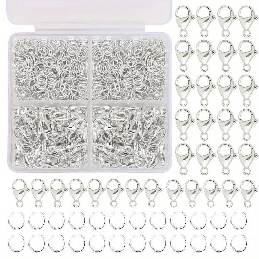 A collection of silver lobster clasps and open jump rings for jewelry making, packaged in a clear plastic case.