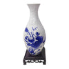 Blue and white porcelain flower vase puzzle featuring a floral design.