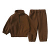 A brown fleece hooded tracksuit set for a child, including a top and matching pants.