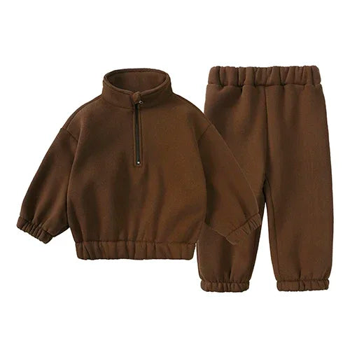 A brown fleece hooded tracksuit set for a child, including a top and matching pants.