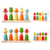 A set of wooden emotion stacking toys in various colors and shapes, arranged in rows.