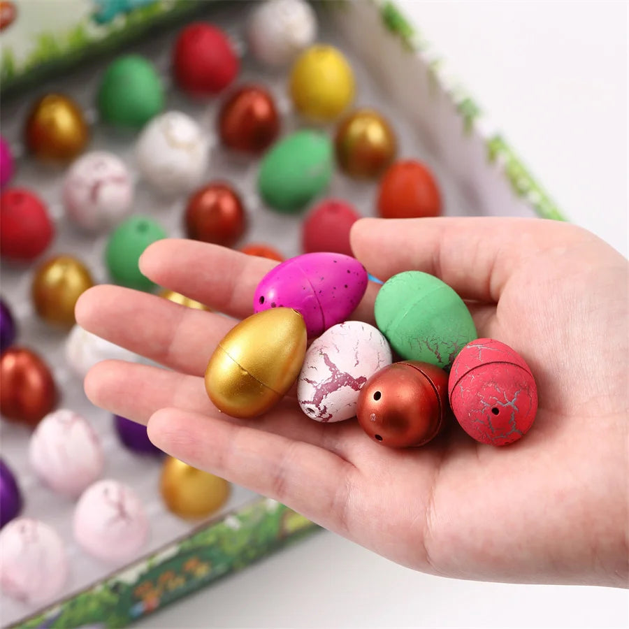 A hand holds a collection of colorful, speckled eggs in a tray for a Magic Dinosaur Egg Hatching Set.