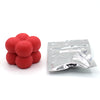 A small plastic bag containing red candle dye chips for wax.