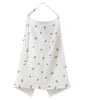 White breathable muslin nursing cover with an adjustable neckline and small floral print
