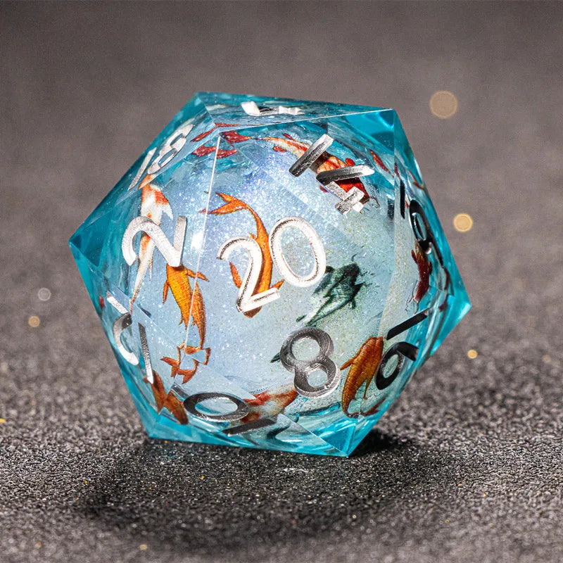 A translucent blue polyhedral die with a galaxy finish rests on a dark, textured surface.