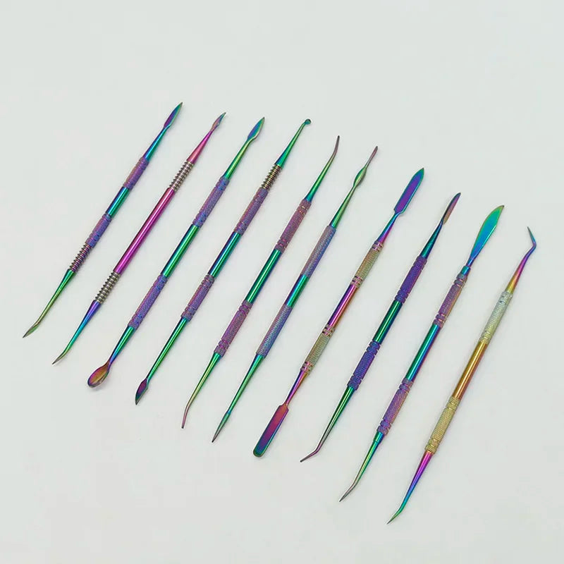 A set of ten colorful stainless steel clay sculpting tools arranged diagonally on a white background.