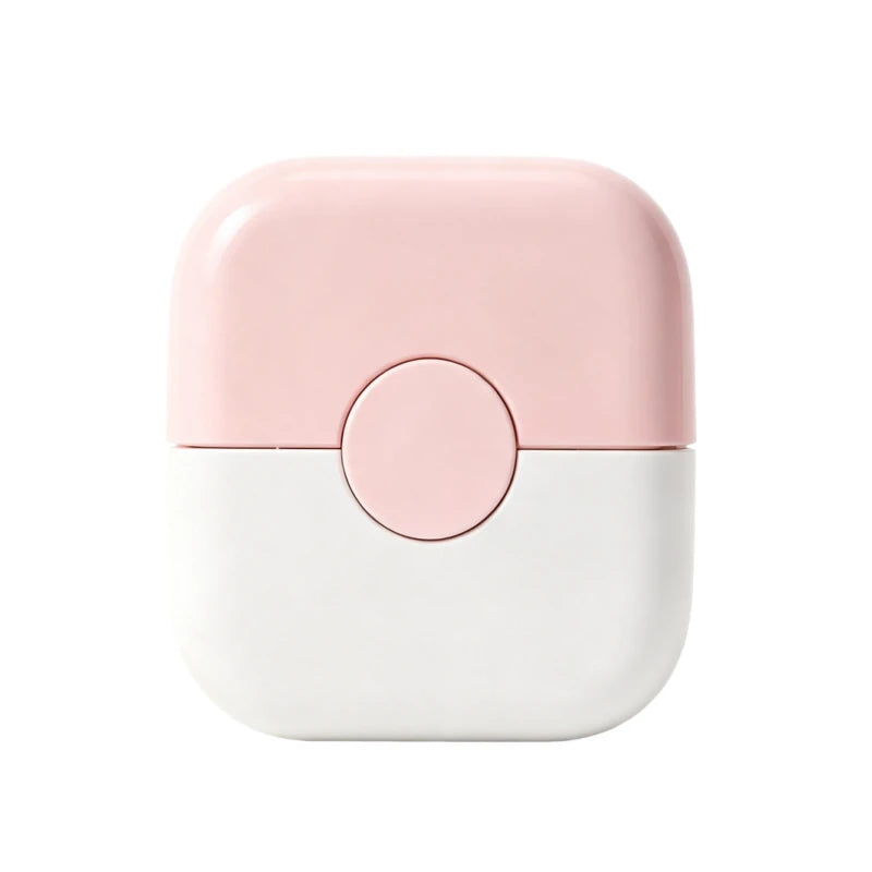 A pink and white 2-in-1 baby hair cutting comb with a dual-edge blade.