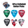 A set of six celluloid guitar picks in various colors and thicknesses, including green, blue, red, and black.