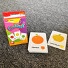 A pack of flash cards for kids featuring orange and apple illustrations on a gray background.