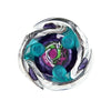 A silver metal spinning top featuring purple and teal colored accents and a detailed internal mechanism.