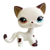 A white and brown charming bobble head cat figurine.