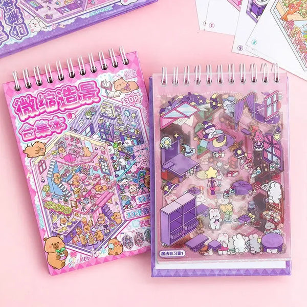 Two pink and purple spiral notebooks filled with colorful stickers depicting miniature scenes and characters.